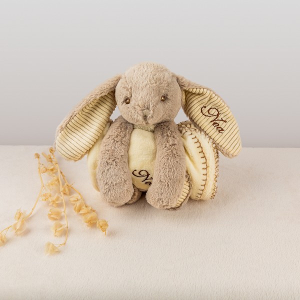 Peluche et couverture, lapin